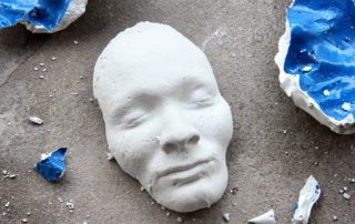 Face of a broken statue